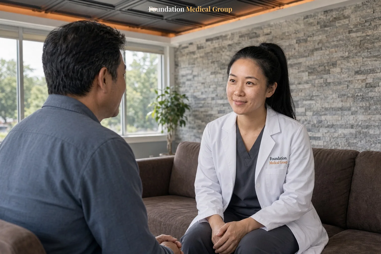 A clinician talks with a patient about what a qEEG brain map can show about depression