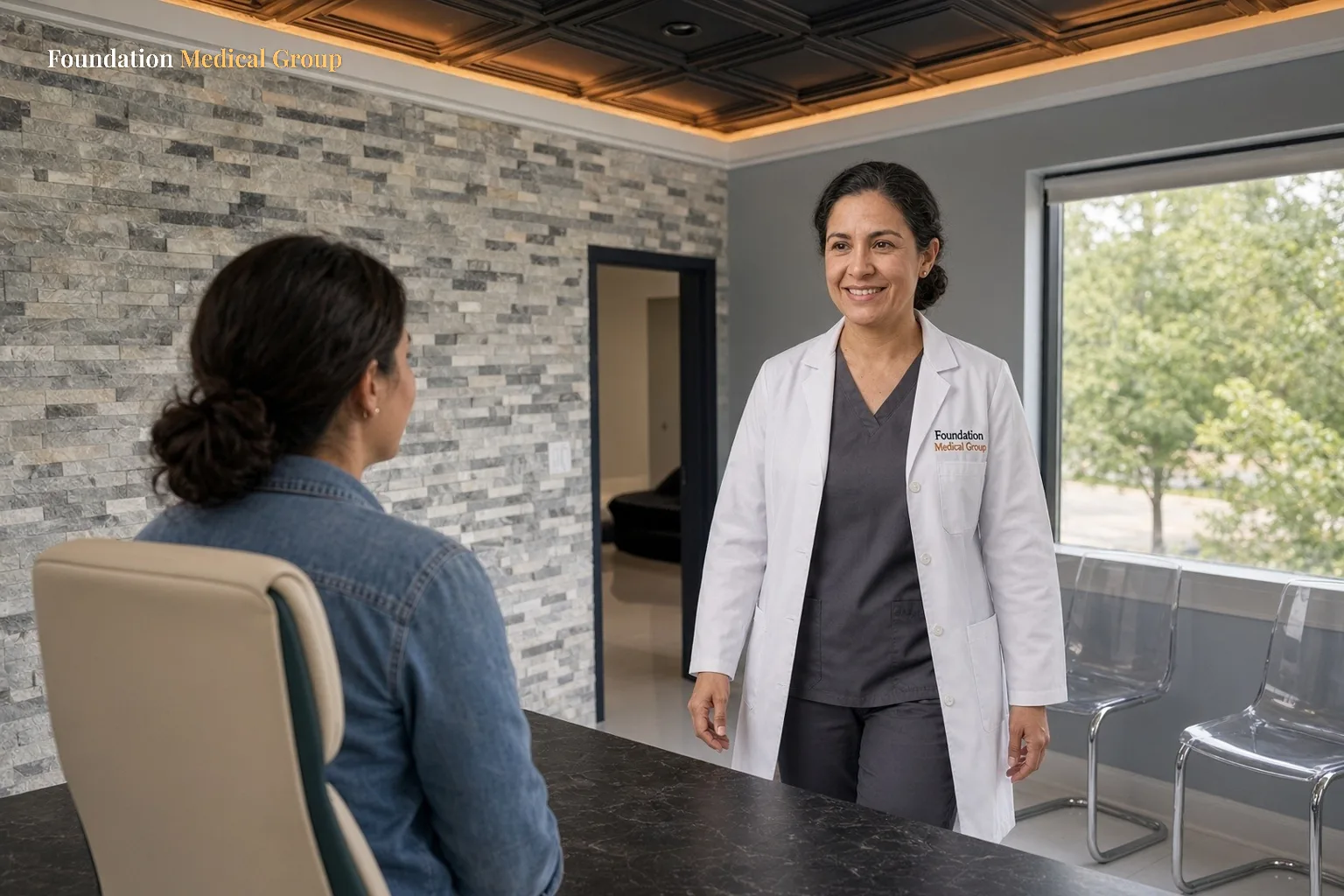 A clinician walks a patient through the length of a single TMS session during a visit