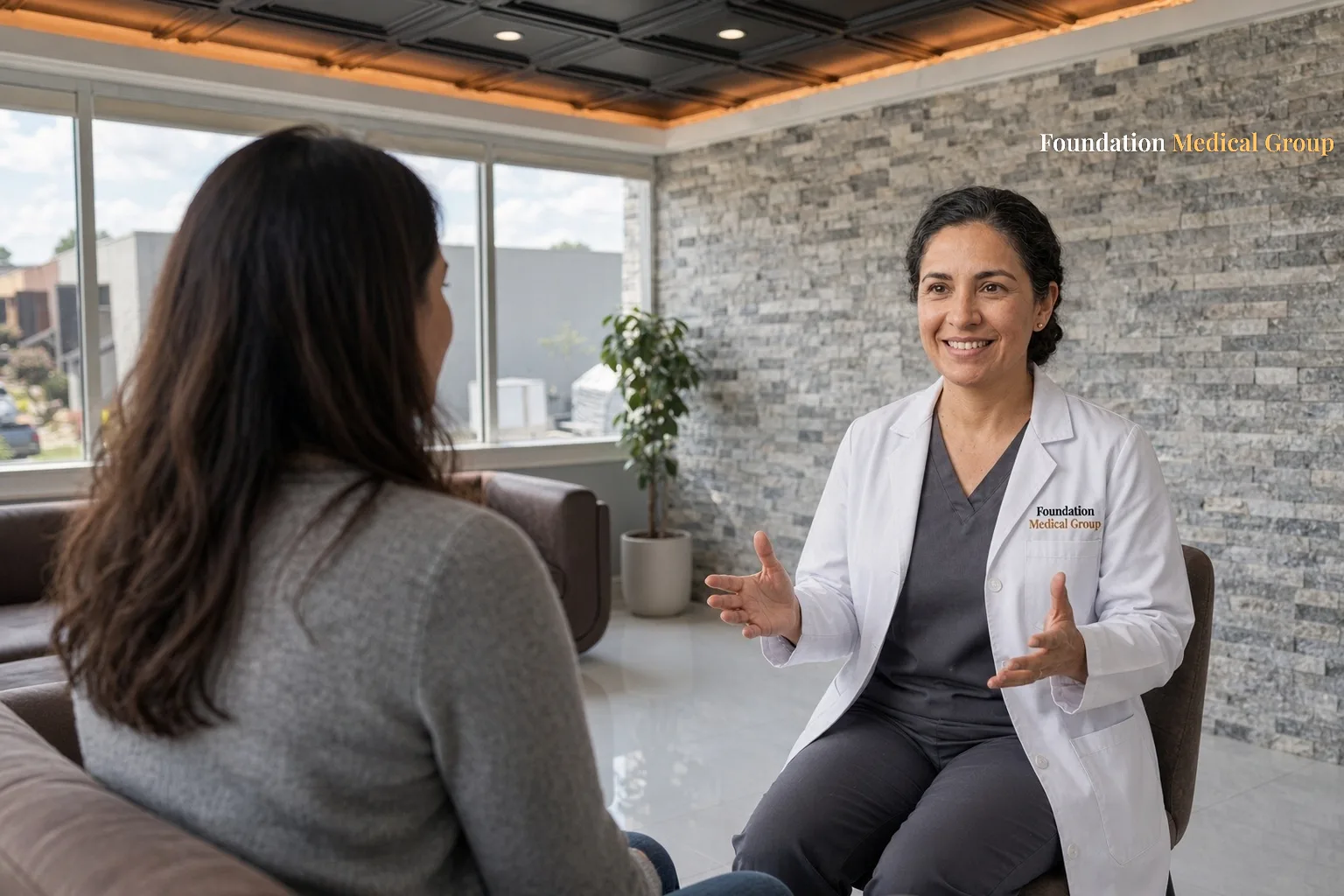 A new mother talks with a clinician about postpartum depression treatment during a calm clinic visit