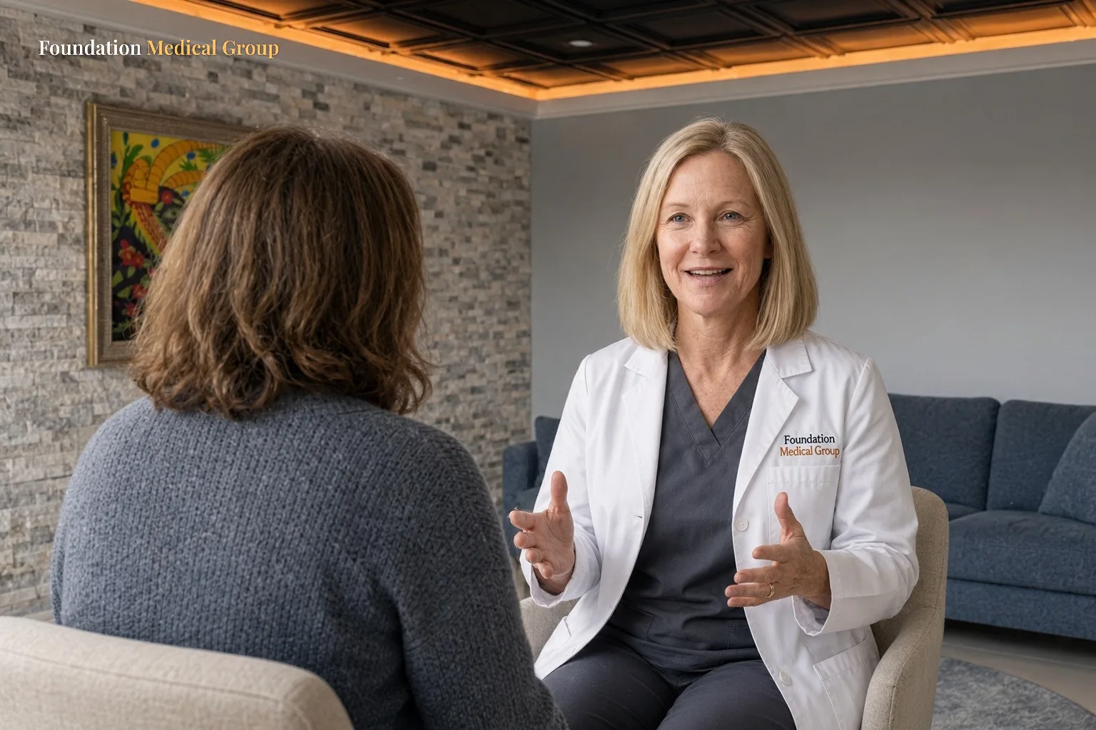 A psychiatric provider talks with a patient during a medication visit