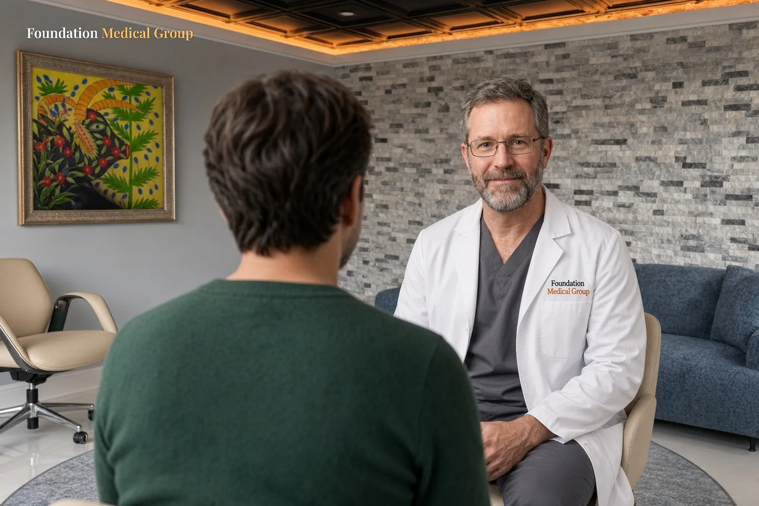 A psychiatric clinician meets a patient in an office to discuss care