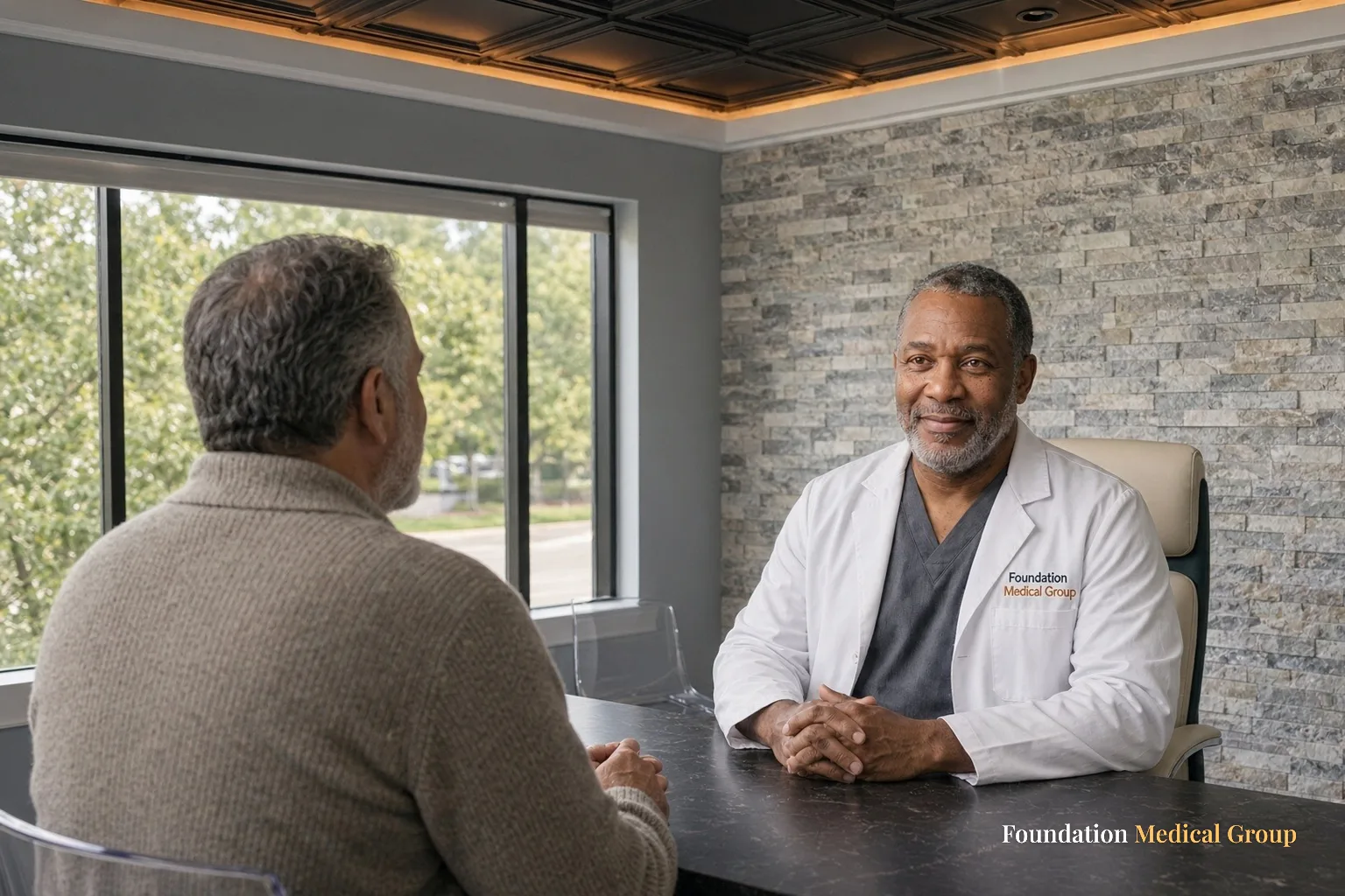 A clinician reviews common Suboxone side effects with a patient at a desk