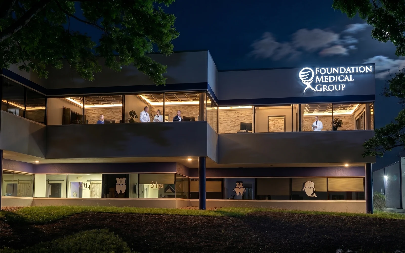 Foundation Medical Group Virginia flagship clinic exterior illuminated at night